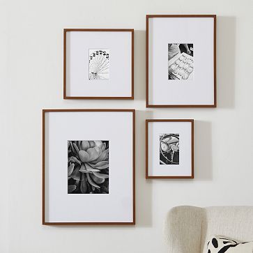 https://assets.weimgs.com/weimgs/rk/images/wcm/products/202352/0005/multi-mat-wood-gallery-frames-walnut-m.jpg