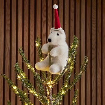 https://assets.weimgs.com/weimgs/rk/images/wcm/products/202401/0018/hugging-polar-bear-tree-topper-m.jpg