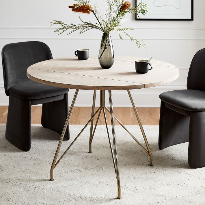 Modern round dining table with leaf discount