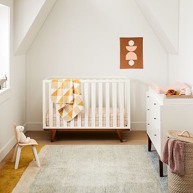 Modern mini crib best sale