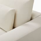 Close-up of chair cushion and seam where fabric meets backrest