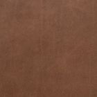 Close-up of brown leather upholstery with a uniform texture and slight patina.