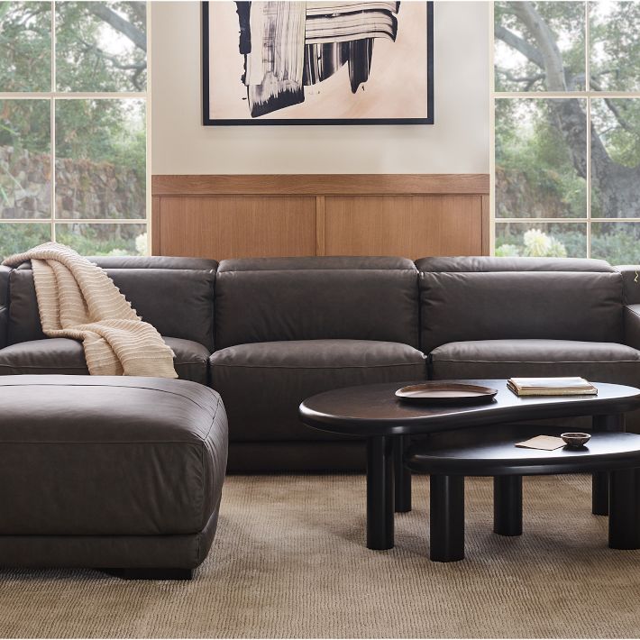 Dalton Motion Leather Ottoman | West Elm