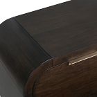 Top of dark wood sideboard with rounded edge and corner joint