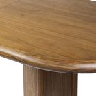 Close-up of rounded front edge of wooden dining table