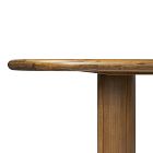 Edge and support of the table against a vertical leg