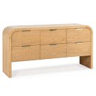 Light wood sideboard with six drawers and rounded edges