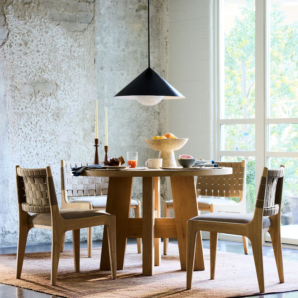 Dunham chairs set at a dining table with tableware