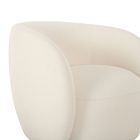 Close-up of the curved outer arm of a beige lounge chair.