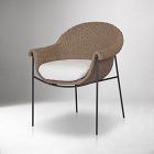 Beige woven wicker chair with light cushion, front view
