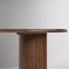 Wooden table leg and underside view showing finish and grain.