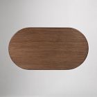 Top of a wooden oval table with rounded ends and grain pattern.