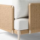 Close-up of woven wicker back panel and cushion