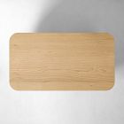 Rounded rectangular wooden tabletop with smooth edges