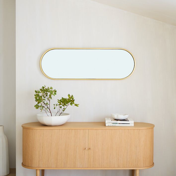 metal-framed-pill-wall-mirror-