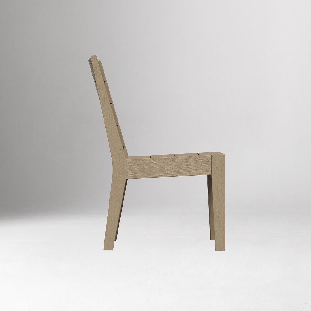 Side profile of Portside dining side chair in tan finish