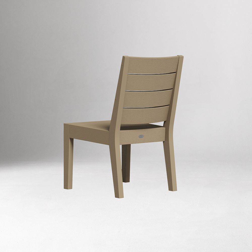 Three-quarter rear angle of Portside dining side chair in tan finish