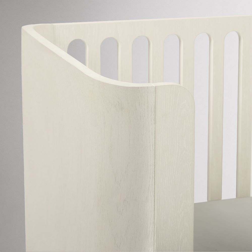 Curved front edge of the conversion kit with wood grain