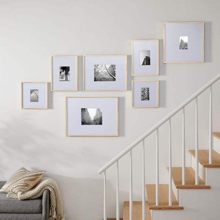 Frames ascending a staircase wall following the stair angle