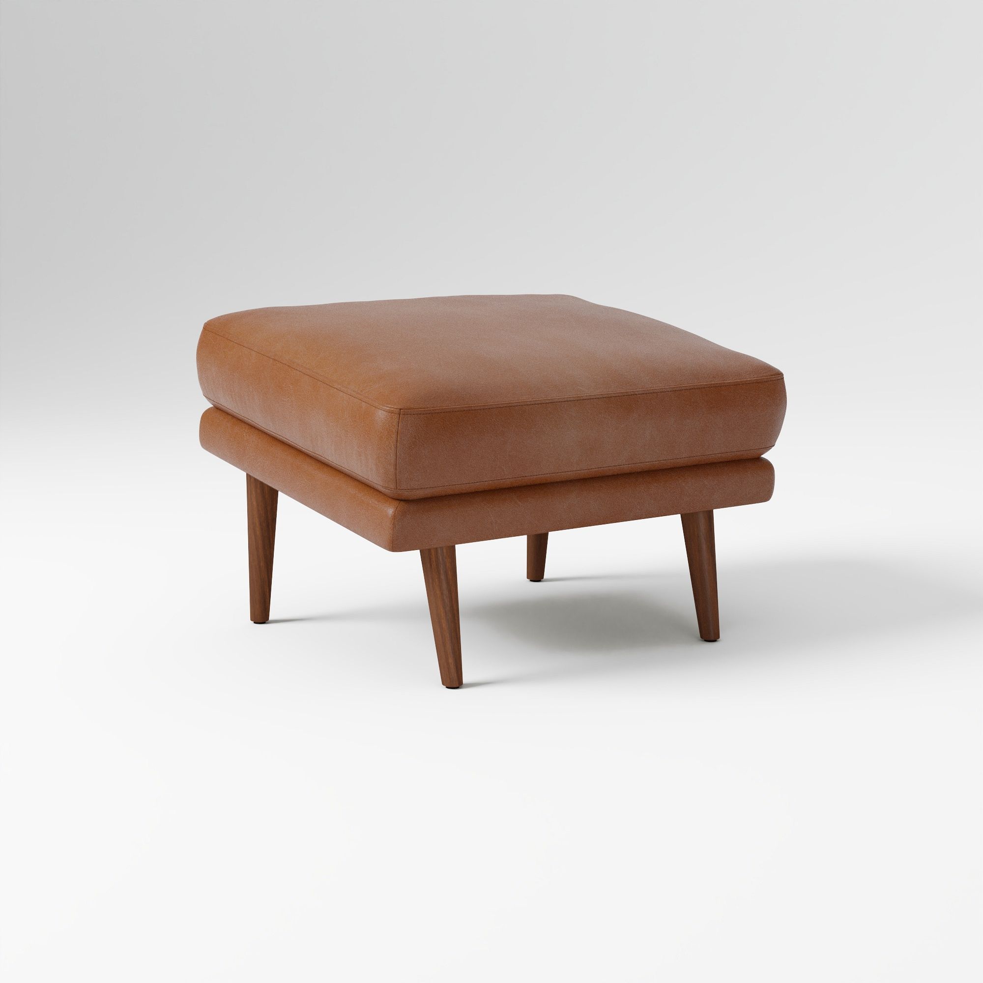Lucia Leather Ottoman - Wood Legs | West Elm