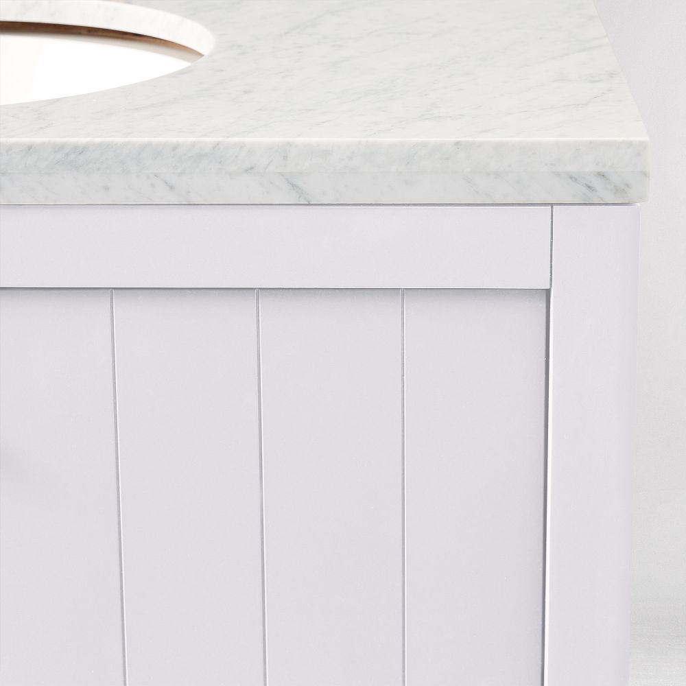 Vertical panel doors and marble edge of vanity