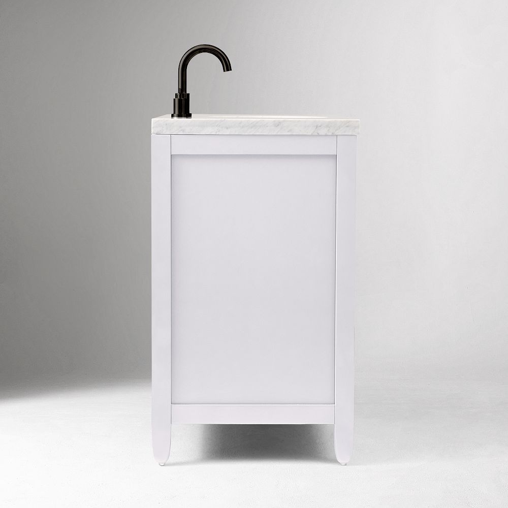 Side view of white vanity with marble top